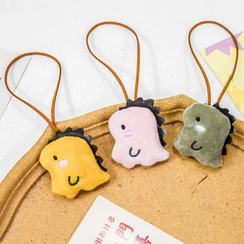 Roztomilý karikatúra dinosaurus plyšový názov TAGE Kľúčová reťazec materská škola Školský vak Anti-Loss Key Rring Deti Kawaii Bag Prívesky