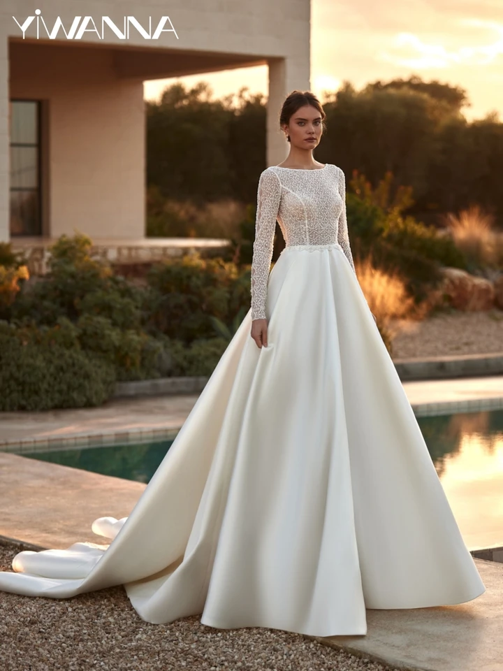 Ručne vyrábané korálky Svadobné šaty sexy ilúzia backless bride rúcho pôvabný čln Dlho svadobné šaty prispôsobené robe de mariée