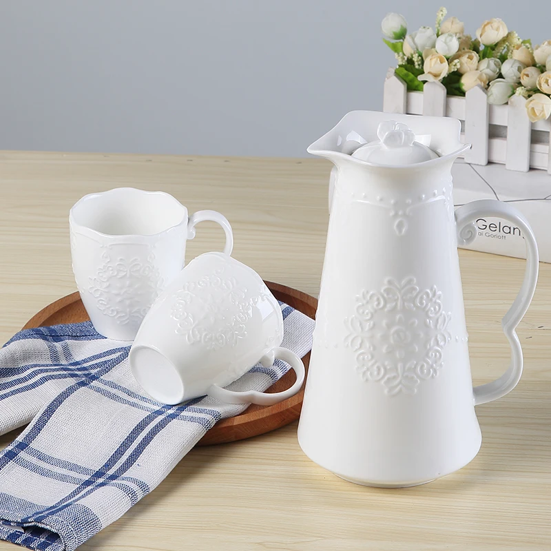 Sada 3pc, biela reliéfna porcelánová čajová hrniec s hrnčekom. Taza Service a tureckú krajinu Coffe Cup, voda