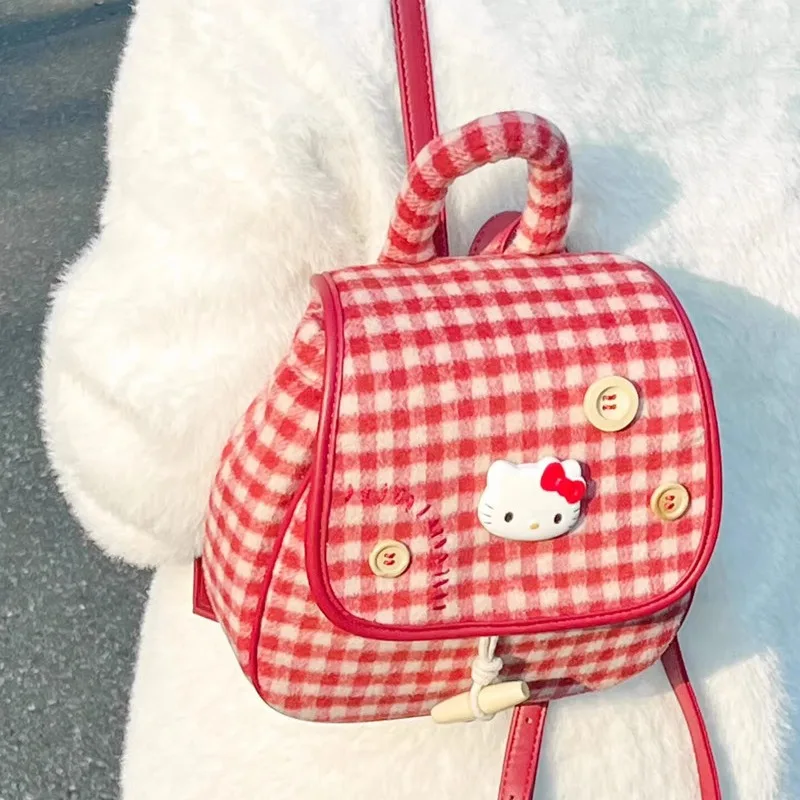 Sanrio Hello Kitty Krásna atmosféra Red Plaid Plaid Small Batoh Woen Wolalen Capacity Cestovanie čerstvé sladké dievčenské svetlo batoh