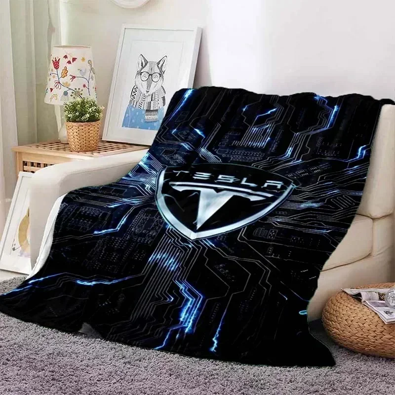 Tesla logo prikrývka Karika