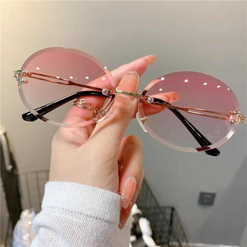 Trendové slnečné okuliare pre ženy Summer Rimless Cut-okrajové slnečné okuliare oválne módne značky Dizajnérske odtiene ružové dámske slnečné okuliare UV400