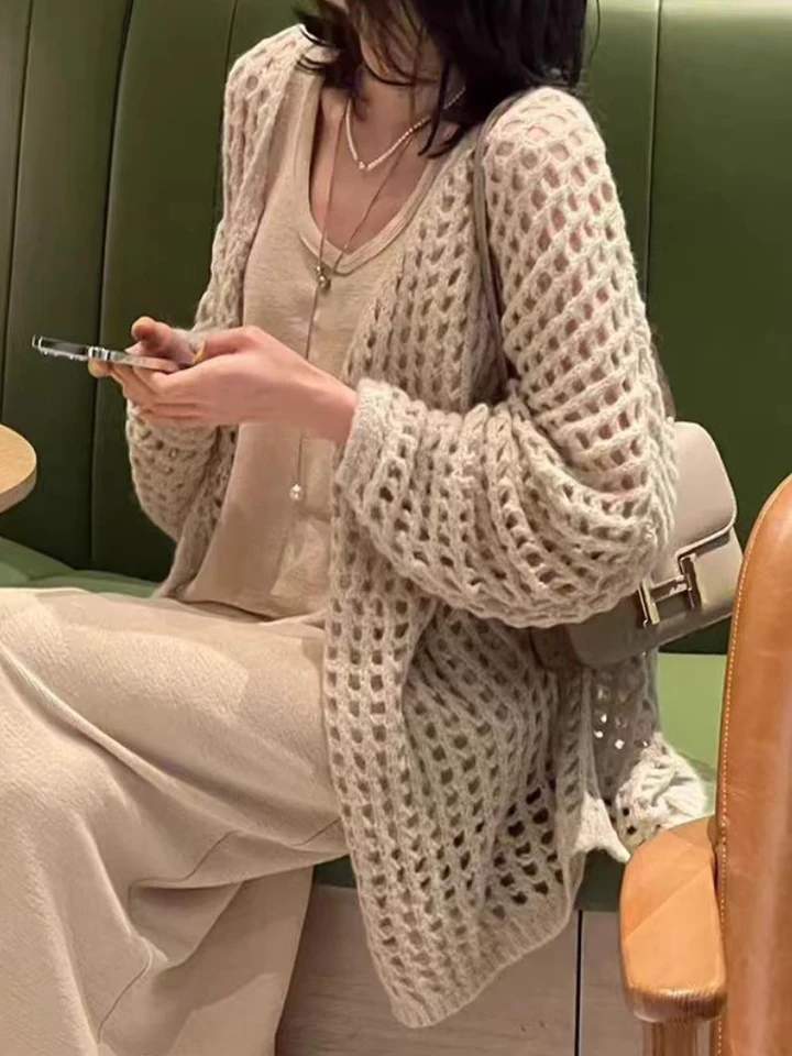 Trendy letné nové príležitostné elegantné dutiny z pleteného sveta všadeprostredne zladené top tenké sveter Dámske oblečenie Outwear Kórejské nové