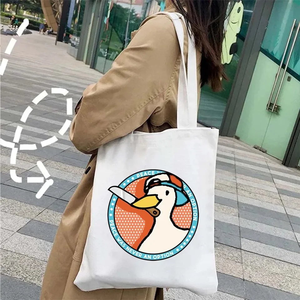 Vtipná hutina Untitled Goose Game Krásna meme kačica roztomilá karikatúra zvierací rameno plátno tote taška neformálne nákupné nakupujúce kabelky
