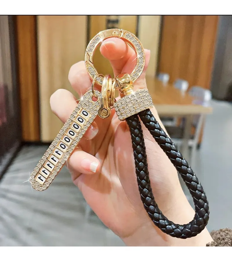 Vysoko kvalitné šperky krištáľové číslo Keychain Anti-Lost Car Keychain Telefónne číslo karta Klávesový kľúče kožené kožené lano doplnky