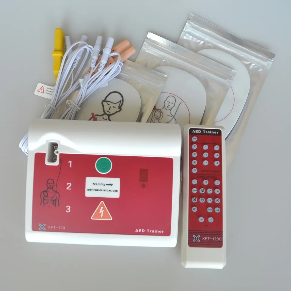 XFT-120C AED prvej pomoci CPR Training Teaching Trainer Device v angličtine a rusky s elektródovými podložkami
