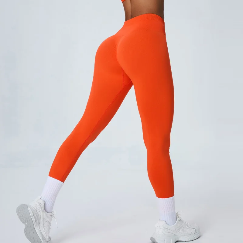Yj-high pas broskyňový bedra HIP Rais Fitness Pants Dámsky beh tesné bezšvové jogové nohavice brušné kontraktované športové nohavice Bežné tro