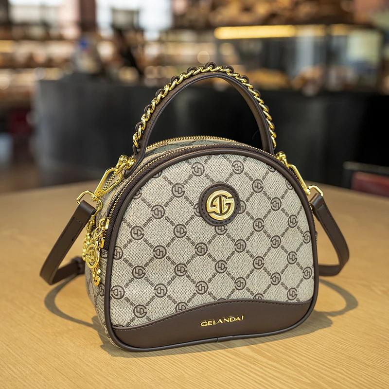 Značka dámska taška 2024 Nová dvojitá priehradka Apple vrecko Kontrastná farba všestranná satchel ramená Crossbody Malé okrúhle vrecko